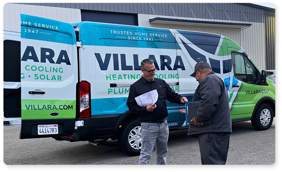 Employees in front of truck